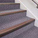 Dark Bronze double insert chevron stair nosing, 70mm riser with Mid Brown inserts, fitted on carpeted stairs