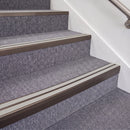 Dark Bronze double insert chevron stair nosing, 70mm riser with Oyster inserts, fitted on carpeted stairs