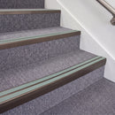 Dark Bronze double insert chevron stair nosing, 70mm riser with Sage Green inserts, fitted on carpeted stairs