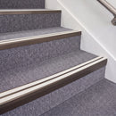 Dark Bronze double insert chevron stair nosing, 70mm riser with White inserts, fitted on carpeted stairs
