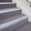Mill Finish double insert chevron stair nosing, 70mm riser with Aura inserts, fitted on carpeted stairs