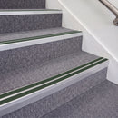 Mill Finish double insert chevron stair nosing, 70mm riser with Dark Green inserts, fitted on carpeted stairs