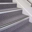 Mill Finish double insert chevron stair nosing, 70mm riser with Dark Grey inserts, fitted on carpeted stairs