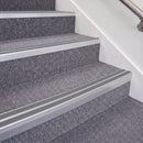 Mill Finish double insert chevron stair nosing, 70mm riser with Mid Grey inserts, fitted on carpeted stairs