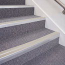 Mill Finish double insert chevron stair nosing, 70mm riser with Oyster inserts, fitted on carpeted stairs