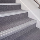 Mill Finish double insert chevron stair nosing, 70mm riser with Polar Grey inserts, fitted on carpeted stairs