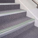 Mill Finish double insert chevron stair nosing, 70mm riser with Sage Green inserts, fitted on carpeted stairs