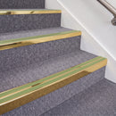 Mirrorflect Gold double insert chevron stair nosing, 70mm riser with Apple Green inserts, fitted on carpeted stairs