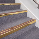 Mirrorflect Gold double insert chevron stair nosing, 70mm riser with Mid Brown inserts, fitted on carpeted stairs