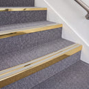 Mirrorflect Gold double insert chevron stair nosing, 70mm riser with Oyster inserts, fitted on carpeted stairs