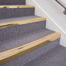 Mirrorflect Gold double insert chevron stair nosing, 70mm riser with Sahara inserts, fitted on carpeted stairs