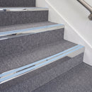 Mirrorflect Silver double insert chevron stair nosing, 70mm riser with Aura inserts, fitted on carpeted stairs