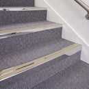 Mirrorflect Silver double insert chevron stair nosing, 70mm riser with Beige inserts, fitted on carpeted stairs