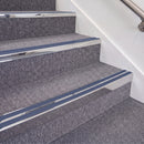 Mirrorflect Silver double insert chevron stair nosing, 70mm riser with Blue inserts, fitted on carpeted stairs