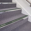 Mirrorflect Silver double insert chevron stair nosing, 70mm riser with Dark Green inserts, fitted on carpeted stairs