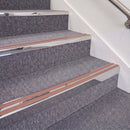 Mirrorflect Silver double insert chevron stair nosing, 70mm riser with Mid Brown inserts, fitted on carpeted stairs