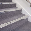 Mirrorflect Silver double insert chevron stair nosing, 70mm riser with Oyster inserts, fitted on carpeted stairs