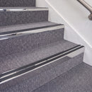 Mirrorflect Silver double insert chevron stair nosing, 70mm riser with Premium Black inserts, fitted on carpeted stairs