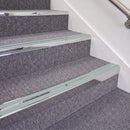 Mirrorflect Silver double insert chevron stair nosing, 70mm riser with Sage Green inserts, fitted on carpeted stairs