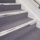 Mirrorflect Silver double insert chevron stair nosing, 70mm riser with White inserts, fitted on carpeted stairs