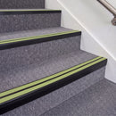 Satin Black double insert chevron stair nosing, 70mm riser with Apple Green inserts, fitted on carpeted stairs
