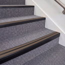 Satin Black double insert chevron stair nosing, 70mm riser with Brown inserts, fitted on carpeted stairs