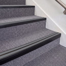 Satin Black double insert chevron stair nosing, 70mm riser with Mid Grey inserts, fitted on carpeted stairs