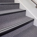 Satin Black double insert chevron stair nosing, 70mm riser with Polar Grey inserts, fitted on carpeted stairs