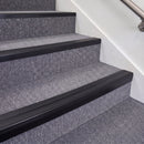 Satin Black double insert chevron stair nosing, 70mm riser with Premium Black inserts, fitted on carpeted stairs