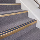 Satin Bronze double insert chevron stair nosing, 70mm riser with Blue inserts, fitted on carpeted stairs