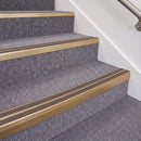 Satin Bronze double insert chevron stair nosing, 70mm riser with Brown inserts, fitted on carpeted stairs