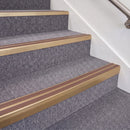 Satin Bronze double insert chevron stair nosing, 70mm riser with Mid Brown inserts, fitted on carpeted stairs