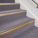 Satin Bronze double insert chevron stair nosing, 70mm riser with Mid Grey inserts, fitted on carpeted stairs