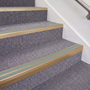 Satin Bronze double insert chevron stair nosing, 70mm riser with Sage Green inserts, fitted on carpeted stairs