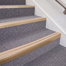 Satin Bronze double insert chevron stair nosing, 70mm riser with Sahara inserts, fitted on carpeted stairs