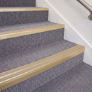 Satin Gold double insert chevron stair nosing, 70mm riser with Beige inserts, fitted on carpeted stairs