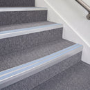 Satin Silver double insert chevron stair nosing, 70mm riser with Aura inserts, fitted on carpeted stairs