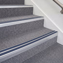 Satin Silver double insert chevron stair nosing, 70mm riser with Blue inserts, fitted on carpeted stairs