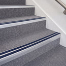 Satin Silver double insert chevron stair nosing, 70mm riser with Dark Blue inserts, fitted on carpeted stairs