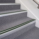 Satin Silver double insert chevron stair nosing, 70mm riser with Dark Green inserts, fitted on carpeted stairs
