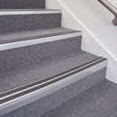 Satin Silver double insert chevron stair nosing, 70mm riser with Dark Grey inserts, fitted on carpeted stairs