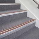 Satin Silver double insert chevron stair nosing, 70mm riser with Mid Brown inserts, fitted on carpeted stairs