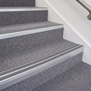 Satin Silver double insert chevron stair nosing, 70mm riser with Mid Grey inserts, fitted on carpeted stairs