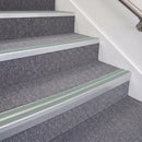 Satin Silver double insert chevron stair nosing, 70mm riser with Sage Green inserts, fitted on carpeted stairs
