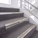 Bright Polished single insert chevron stair nosing, 65mm riser with Beige insert, fitted on carpeted stairs