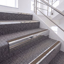 Bright Polished single insert chevron stair nosing, 65mm riser with Brown insert, fitted on carpeted stairs