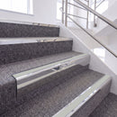 Bright Polished single insert chevron stair nosing, 65mm riser with Oyster insert, fitted on carpeted stairs