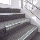 Bright Polished single insert chevron stair nosing, 65mm riser with Sage Green insert, fitted on carpeted stairs