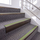 Dark Bronze single insert chevron stair nosing, 65mm riser with Apple Green insert, fitted on carpeted stairs