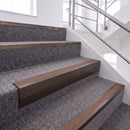 Dark Bronze single insert chevron stair nosing, 65mm riser with Mid Brown insert, fitted on carpeted stairs